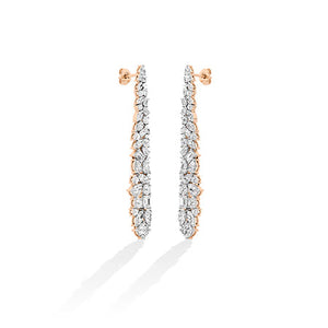 Round Lab-Grown Diamond Earrings in 18K rose gold, worn on model | Binson Diamonds