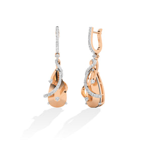 Round Lab-Grown Diamond Earrings in 18K rose gold, worn on model